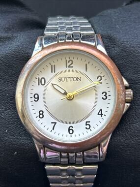 Sutton Silver Tone Worn Bronze Tone Bezel Women’s Stretch Band Quartz Watch